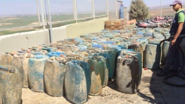 Jerrycans seized from smugglers from Syria