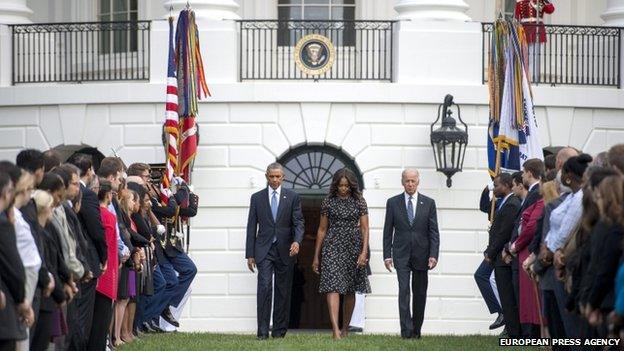 President Obama with wife Michelle and Vice-President Joe Biden