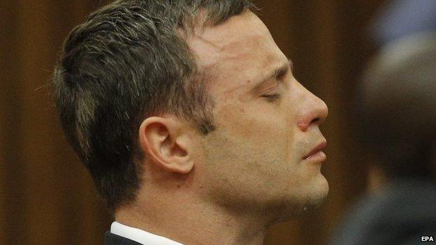 South African Paralympic athlete Oscar Pistorius cries while the verdict is being read during the verdict in his murder trial, Pretoria, South Africa, 11 September 2014