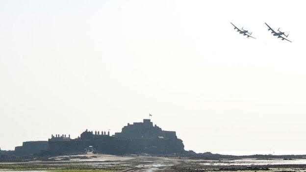 Lancasters fly over Elizabeth Castle