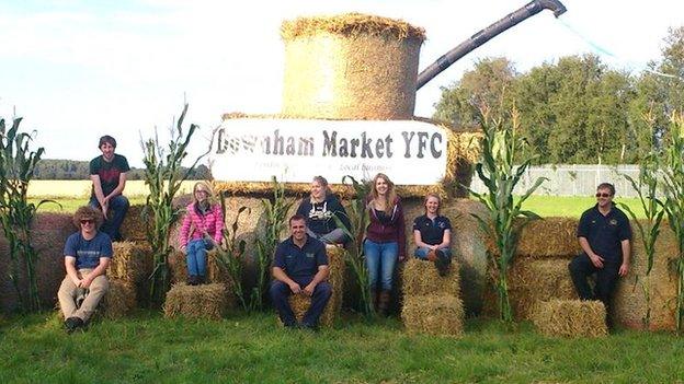 A combine harvester made out of hay bales