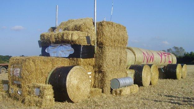 A tanker made out of hay bales