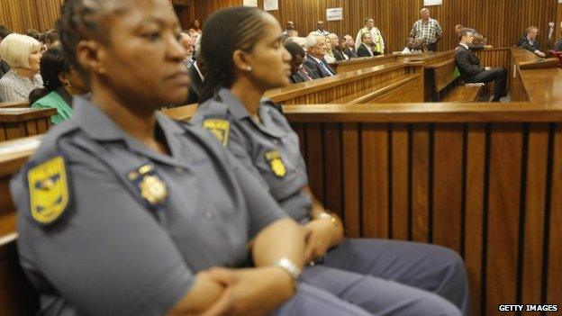 Security guards in the courtroom where Oscar Pistorius' verdict was being read out - Pretoria, South Africa - 11 September 2014