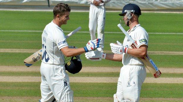 Sam Hain is congratulated on becoming English county cricket's youngest-ever double centurion