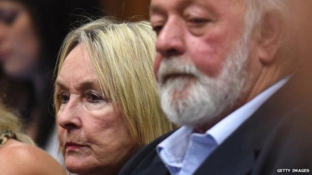 Reeva Steenkamp's parents, Barry Steenkamp and June Steenkamp, sit in the Pretoria High Court on 11 September 2014, in Pretoria, South Africa