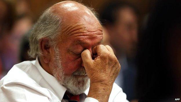 Barry Steenkamp, father of Reeva Steenkamp, reacts as judgment is handed down in the murder trial of South African Paralympic athlete Oscar Pistorius in the High Court in Pretoria, 12 September 2014