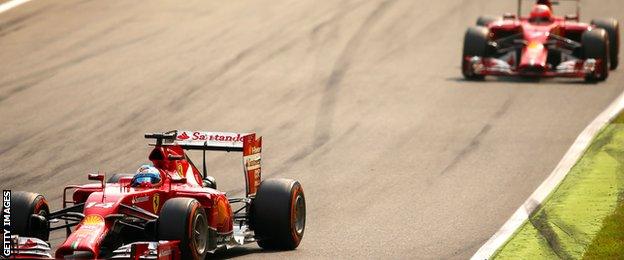 Fernando Alonso of Spain and Ferrari and Kimi Raikkonen of Finland and Ferrari drive during the F1 Grand Prix of Italy at Autodromo di Monza on September 7, 2014 in Monza.