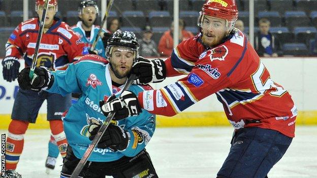 Darryl Lloyd of the Belfast Giants in action against Kyle Fleming of the Edinburgh Capitals