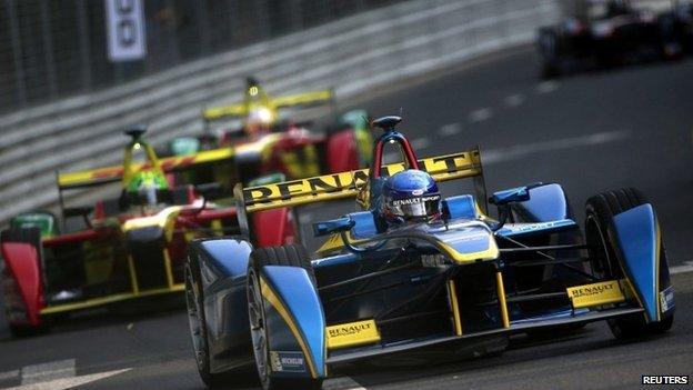 E.Dams-Renault driver Nicolas Prost of France takes the lead in the Formula E Championship race in Beijing 13/09/2014