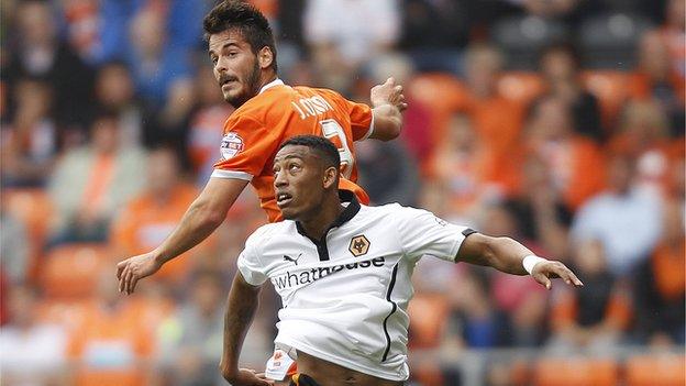 Blackpool-Wolves, Bloomfield Road, 13 September 2014. Joan Oriol outjumps Rajiv Van La Parra