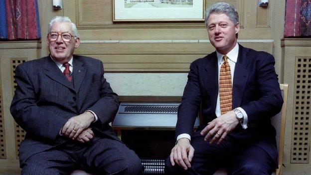 U.S. President Bill Clinton (R) meeting with Democratic Unionist Party leader Ian Paisley at Queen"s University in Belfast in Nov 1995