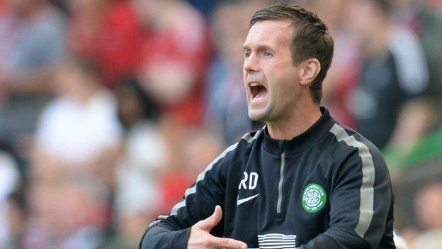 Celtic manager Ronny Deila watches his team defeat Aberdeen 2-1.