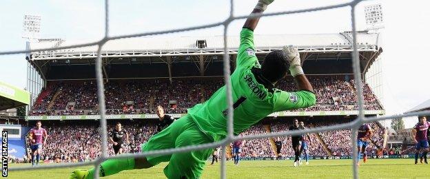 Julian Speroni saves a penalty against Burnley