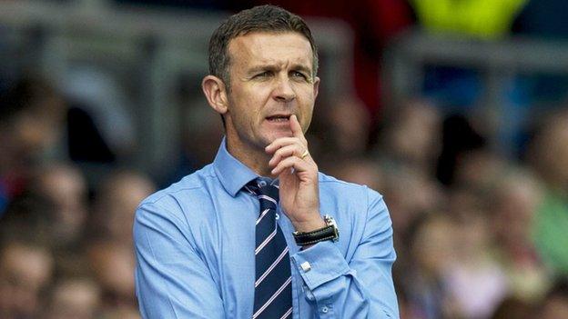 Ross County manager Jim McIntyre watches the 2-1 defeat to Motherwell.