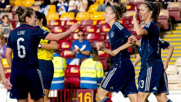 Jane Ross (right) is hailed after making it 3-0 Scotland