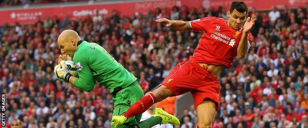 Brad Guzan and Dejan Lovren