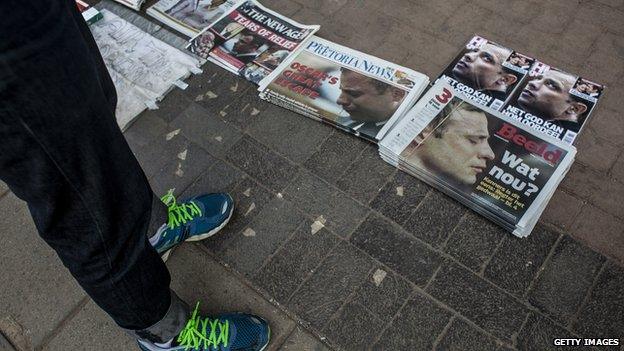 A newspaper headlines Oscar Pistorius as he is given bail at North Gauteng High Court on 12 September 2014 in Pretoria, South Africa.