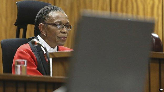 Judge Thokozile Masipa delivers her judgement in court in Pretoria, South Africa, on 12 September 2014