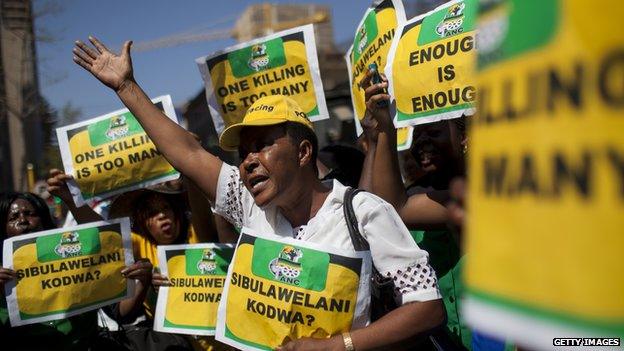 Members of the ANC Women's League protest Oscar Pistorius outside the North Gauteng High Court on 11 September 2014 in Pretoria, South Africa