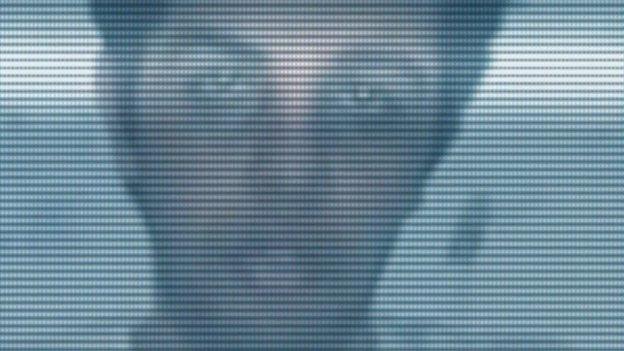 a person in front of a screen