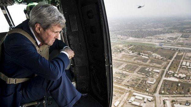 US Secretary of State John Kerry looks out from a helicopter over Baghdad, Iraq - 10 September 2014