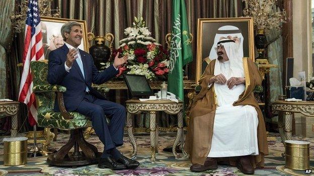 Saudi King Abdullah bin Abdul Aziz al-Saud, right, listens to US Secretary of State John Kerry during a meeting at the Royal Palace in Jeddah, Saudi Arabia - 11 September 2014