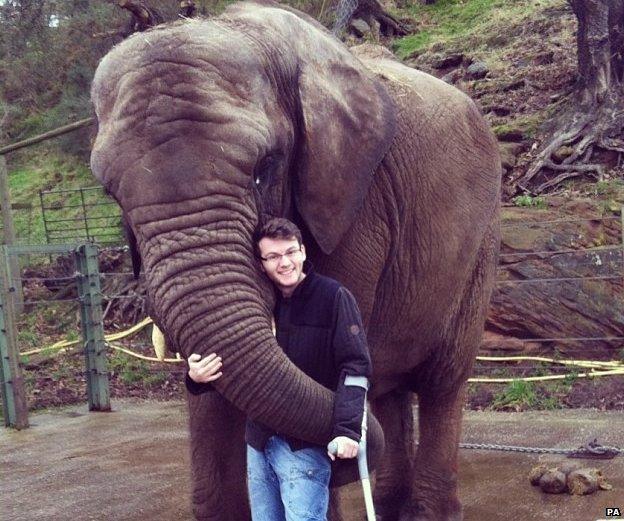 Stephen Sutton hugs an elephant