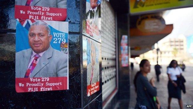 An election poster of Fiji's military strongman Voreqe Bainimarama is seen in Suva, the capital of Fiji, on 15 September 2014