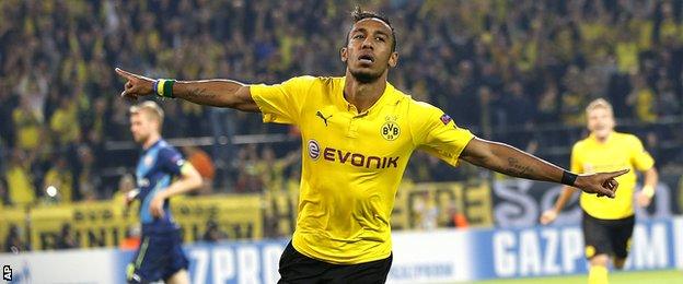 Borussia Dortmund"s Pierre-Emerick Aubameyang celebrates scoring his side"s second goal against Arsenal