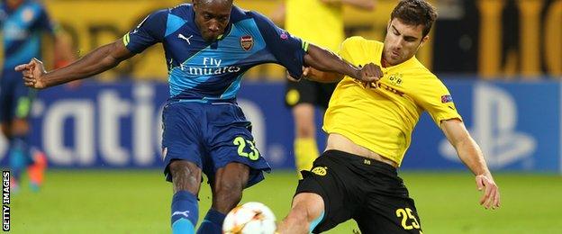 Arsenal's Danny Welbeck attempts a shot in his side's 2-0 Champions League defeat at Borussia Dortund