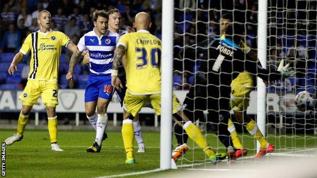 Simon Cox scores Reading's second goal against Millwall