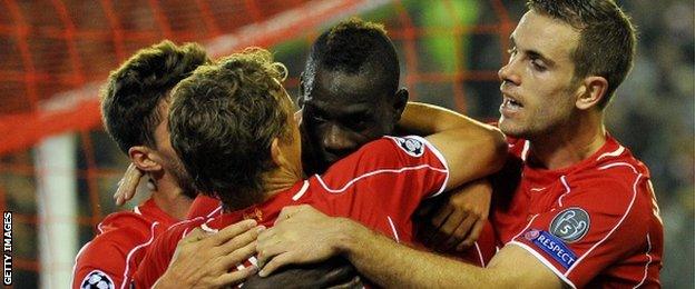 Mario Balotelli celebrates his first Liverpool goal