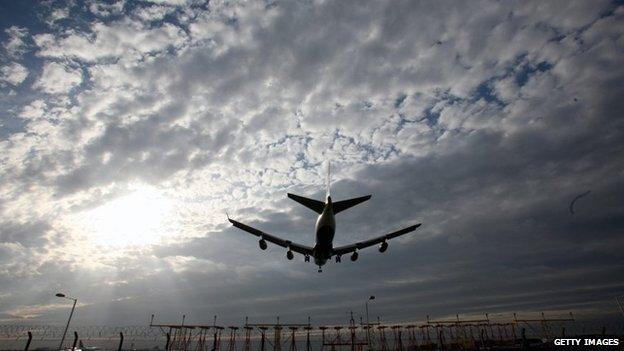 A plane landing at Heathrow Airport