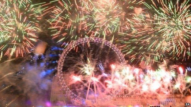 Fireworks explode over London on 1 January 2014