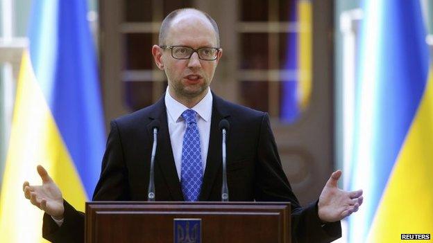 File photo: Ukraine's Prime Minister Arseniy Yatseniuk speaks to the media in Kiev, 31 July 2014