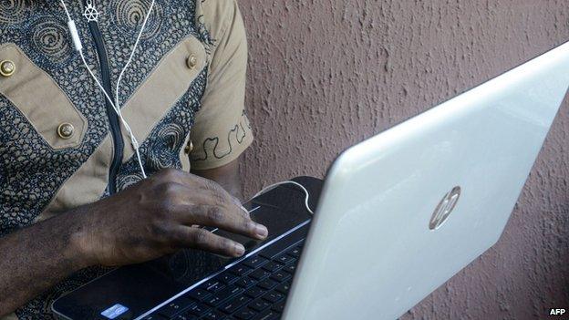 A Nigerian man on a laptop in Lagos - April 2014
