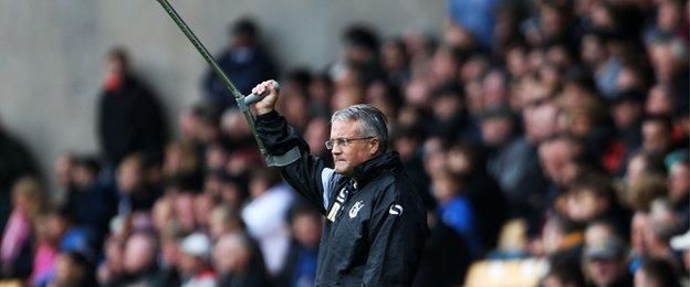 Port Vale manager Micky Adams on his crutches at Vale Park