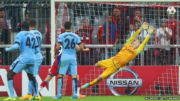 Joe Hart of Manchester City fails to stop the shot by Jerome Boateng