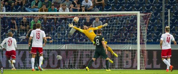 Craig Gordon makes a save for Celtic against Red Bull Salzburg