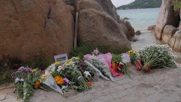 Flowers laid near the scene of where Ms Witheridge and Mr Miller were found