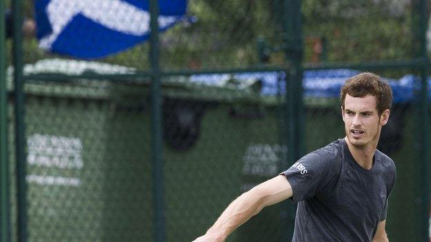 Andy Murray with the Scottish Saltire behind