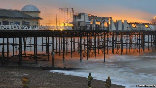 Hastings Pier on fire as dawn breaks