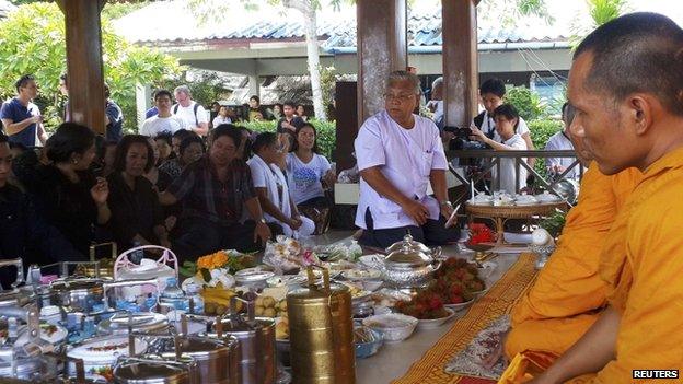 A prayer meeting led by Buddhist monks