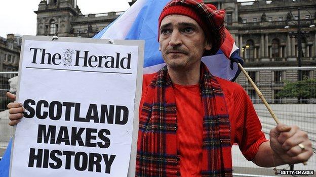 A pro-independence supporter is pictured in George Square in Glasgow, Scotland, on 19 September 2014 following a defeat in the referendum on Scottish independence.