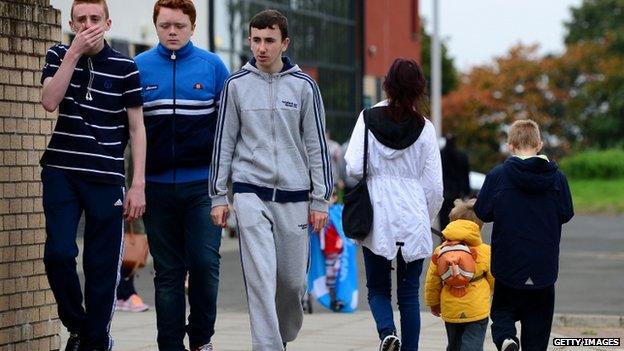 young people outside polling station