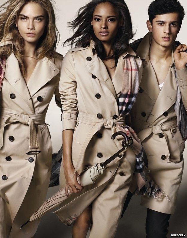 Models Cara Delevingne, left, Malaika Firth, centre, and Tarun Nijjer feature in Burberry's latest ad campaign