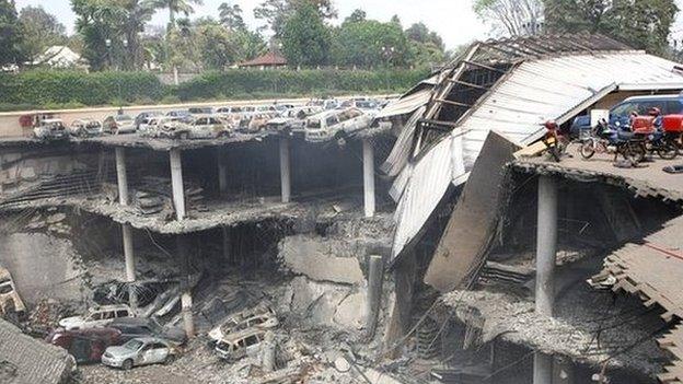 Remains of cars and other debris can be seen of the parking lot outside the Westgate mall in Nairobi, Kenya - 26 September 2013