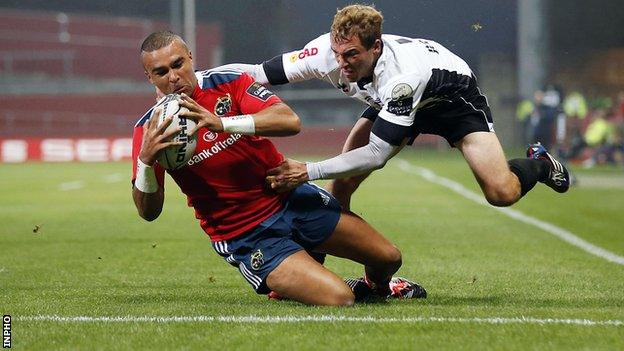 Simon Zebo bursts past Zebre's Giulio Toniolatti to score one of his tries