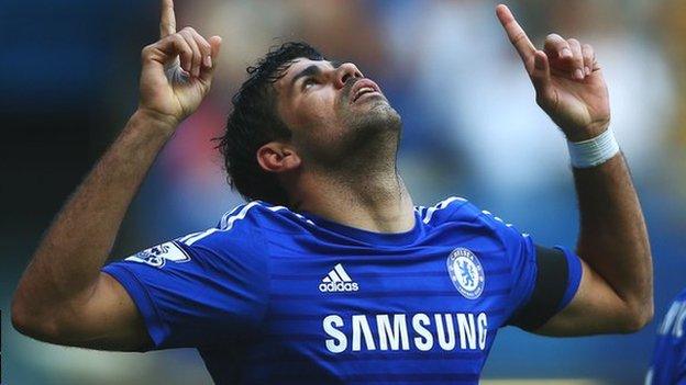 Diego Costa celebrates scoring against Swansea