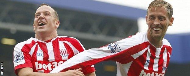 Charlie Adam and Peter Crouch